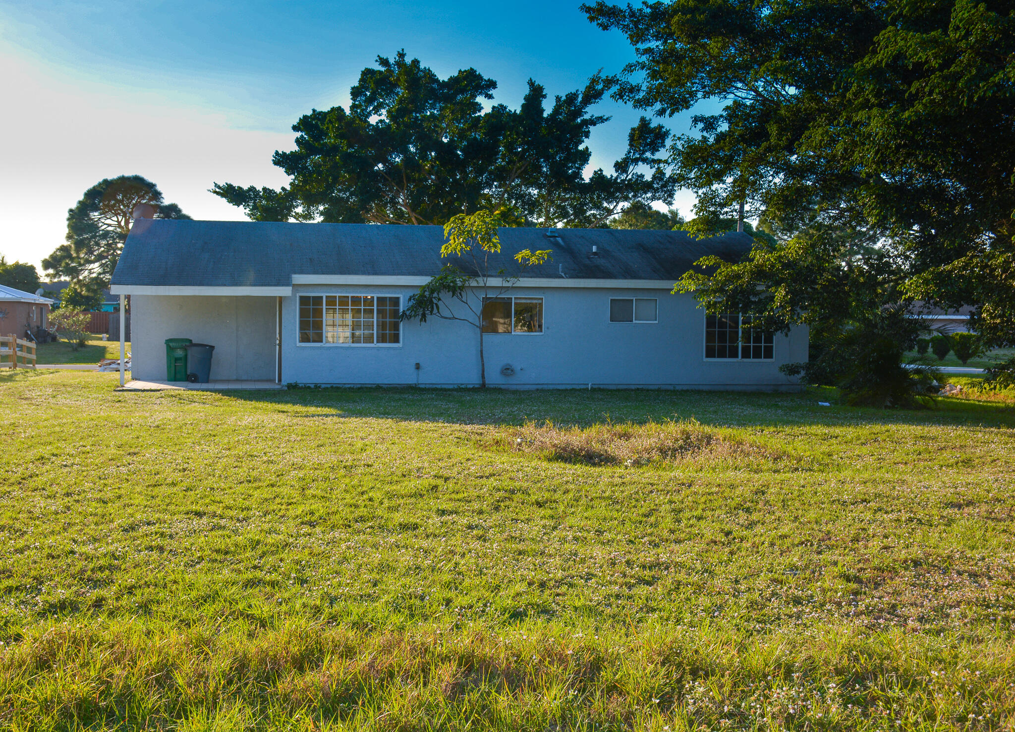 377 Southwest Cherryhill Road Port St. Lucie, FL 34953 - Photo 9 of 9 a house view with a garden space