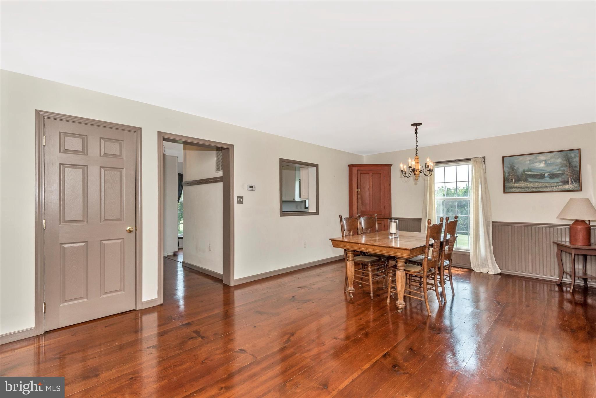 11728 Beaver Dam Road Union Bridge, MD 21791 - Photo 15 of 49 Large Dining Room off Kitchen has Barnwood Floors