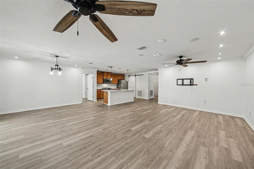 111 Lakeside Court Bunnell, FL 32110 - Photo 13 of 27 a view of empty room with wooden floor