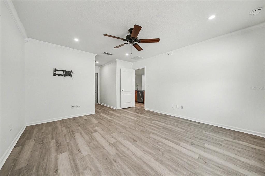 111 Lakeside Court Bunnell, FL 32110 - Photo 17 of 27 wooden floor in an empty room with a window