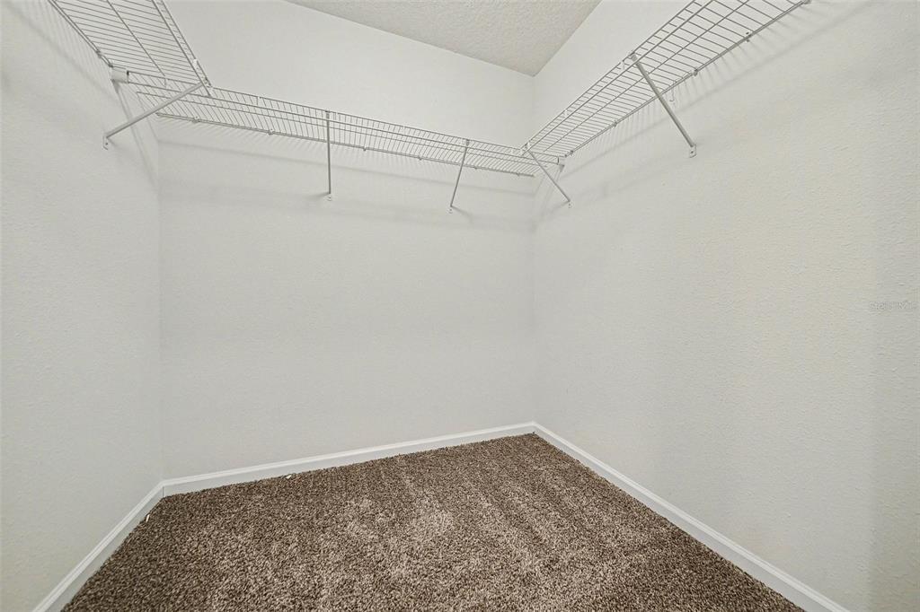 111 Lakeside Court Bunnell, FL 32110 - Photo 18 of 27 a view of a room with racks on the wall