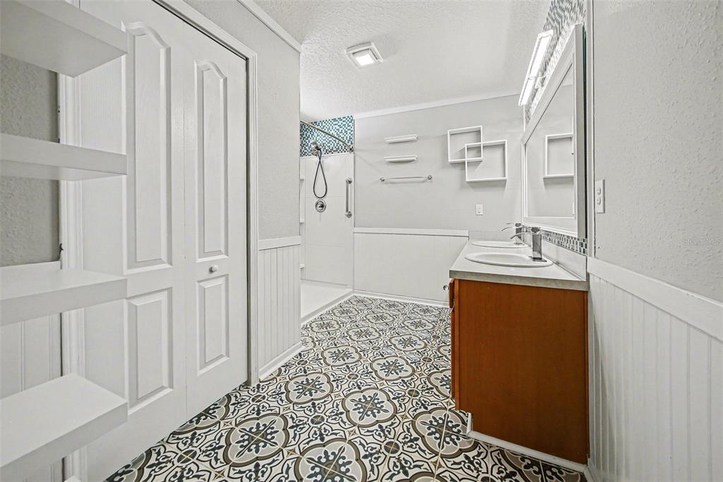 111 Lakeside Court Bunnell, FL 32110 - Photo 19 of 27 a bathroom with a bathtub and a sink