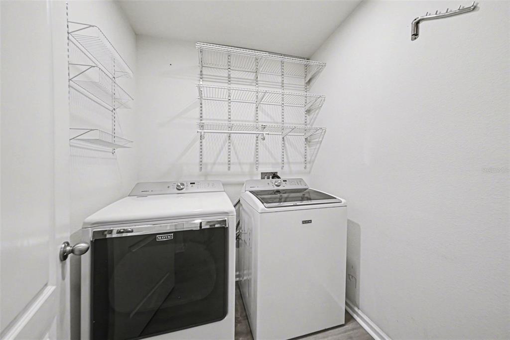 111 Lakeside Court Bunnell, FL 32110 - Photo 21 of 27 a utility room with dryer and washer