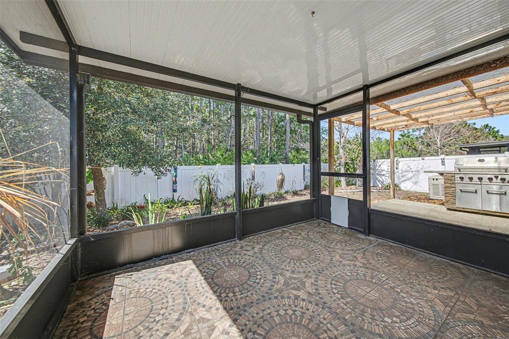 111 Lakeside Court Bunnell, FL 32110 - Photo 23 of 27 a living room with a large window