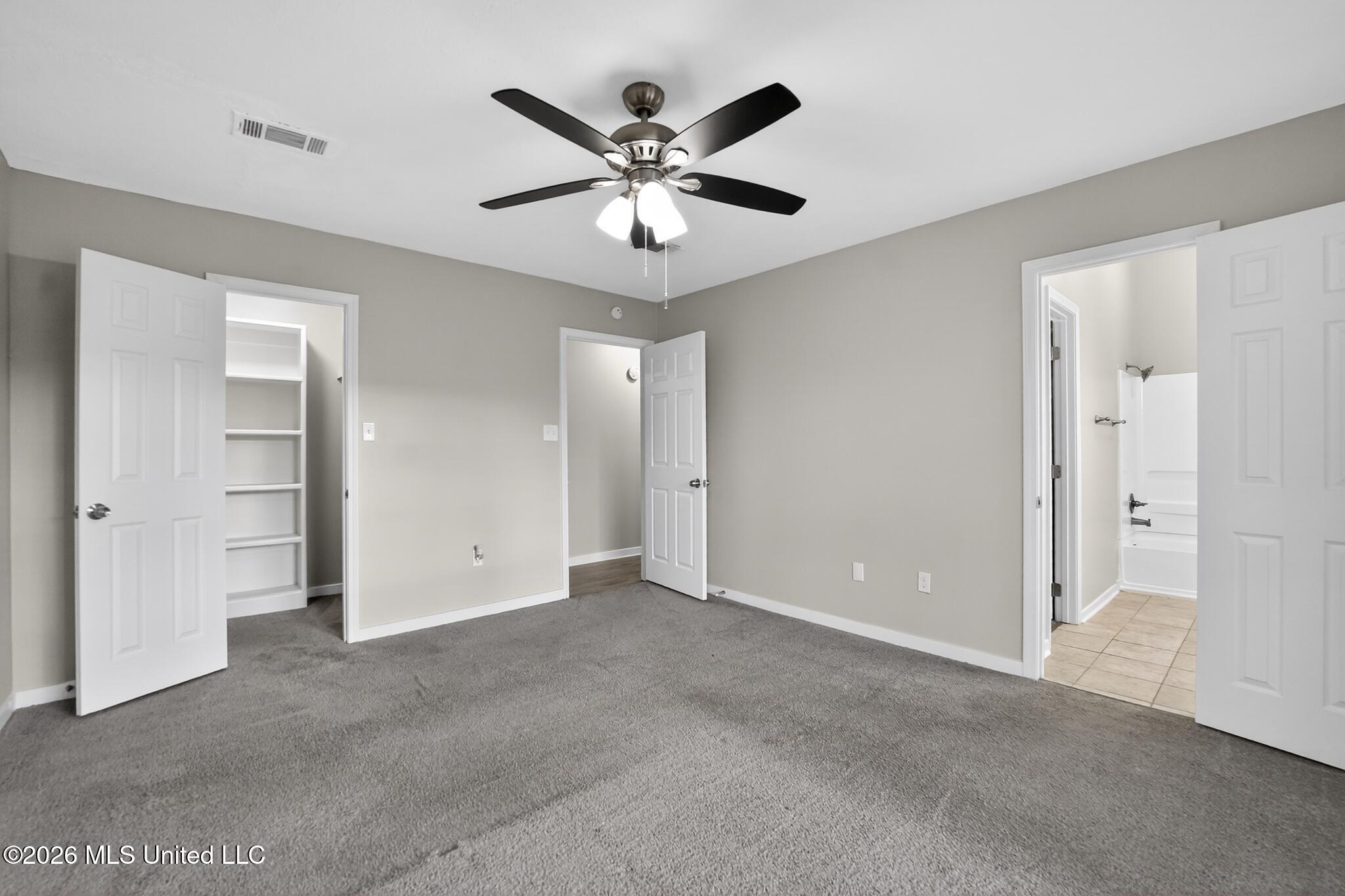 704 Dunleith Lane Ridgeland, MS 39157 - Photo 8 of 15 12_704_Dunleith_Ln-Bedroom-7611