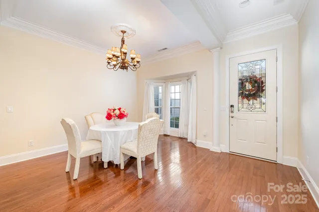 a living room with furniture flat screen tv and a fireplace