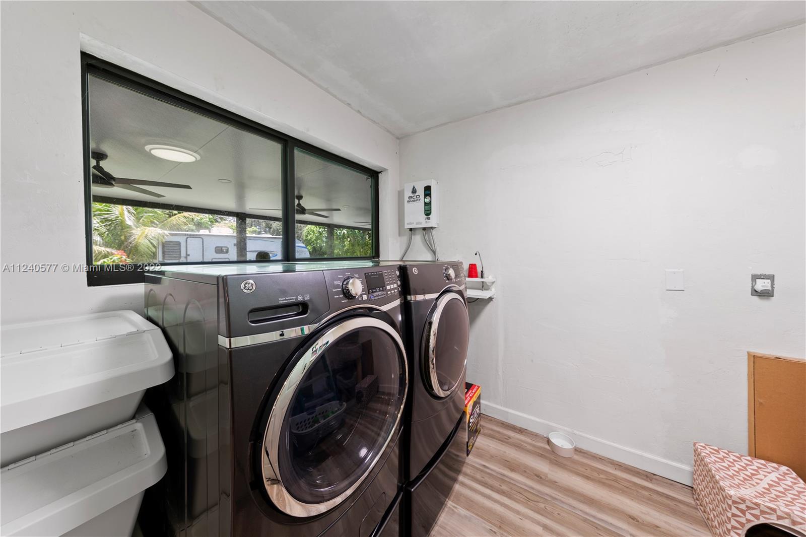 19760 Southwest 242nd Terrace Homestead, FL 33031 - Photo 24 of 49 a view of livingroom with washer and dryer