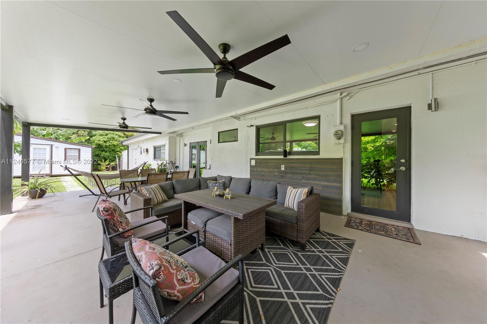 19760 Southwest 242nd Terrace Homestead, FL 33031 - Photo 27 of 49 a living room with furniture and a window