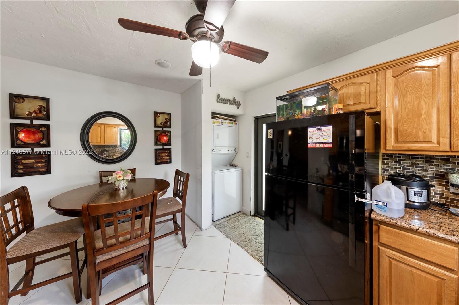 19760 Southwest 242nd Terrace Homestead, FL 33031 - Photo 29 of 49 a living room with furniture and a mirror