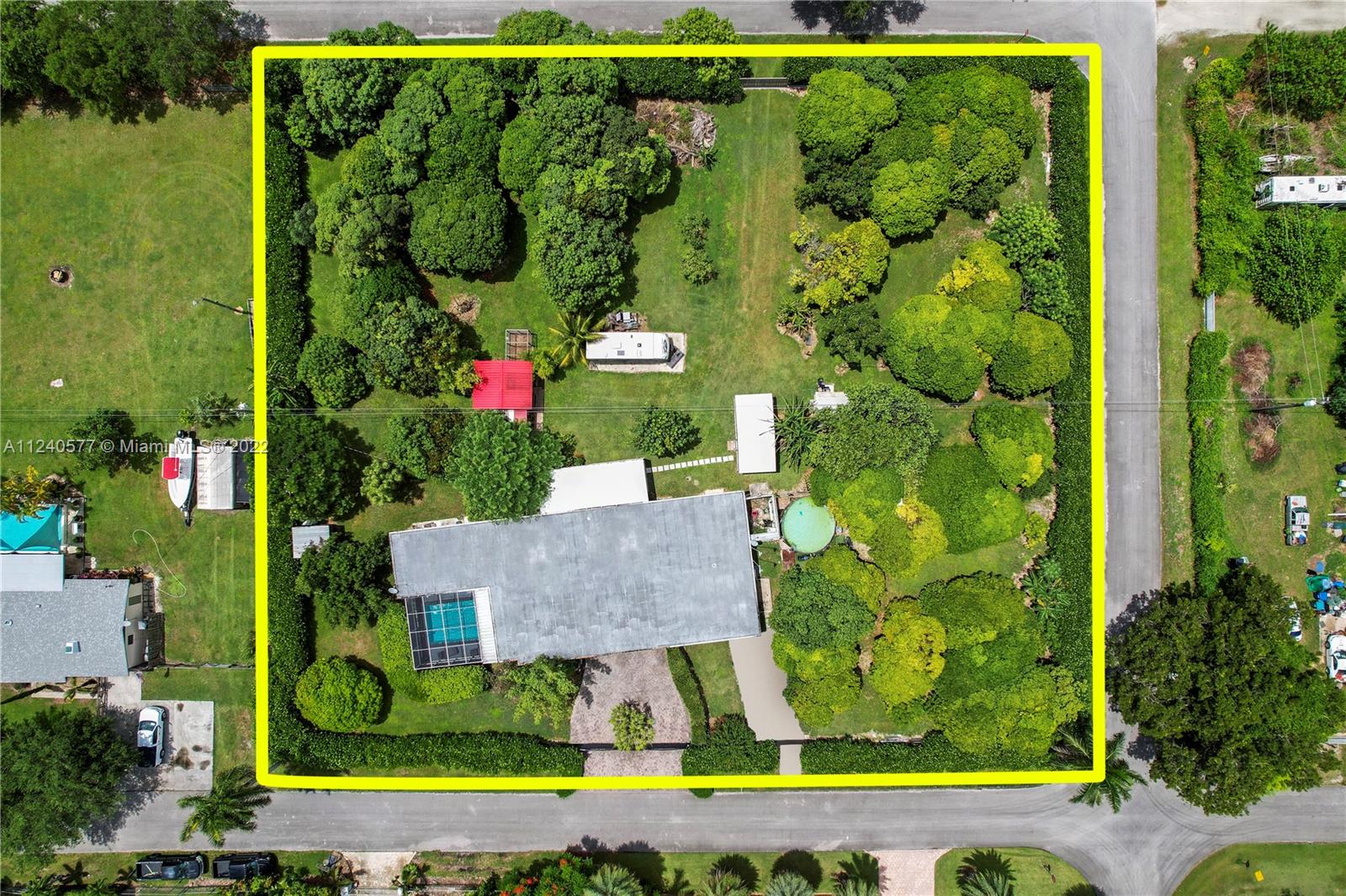 19760 Southwest 242nd Terrace Homestead, FL 33031 - Photo 3 of 49 an aerial view of a house