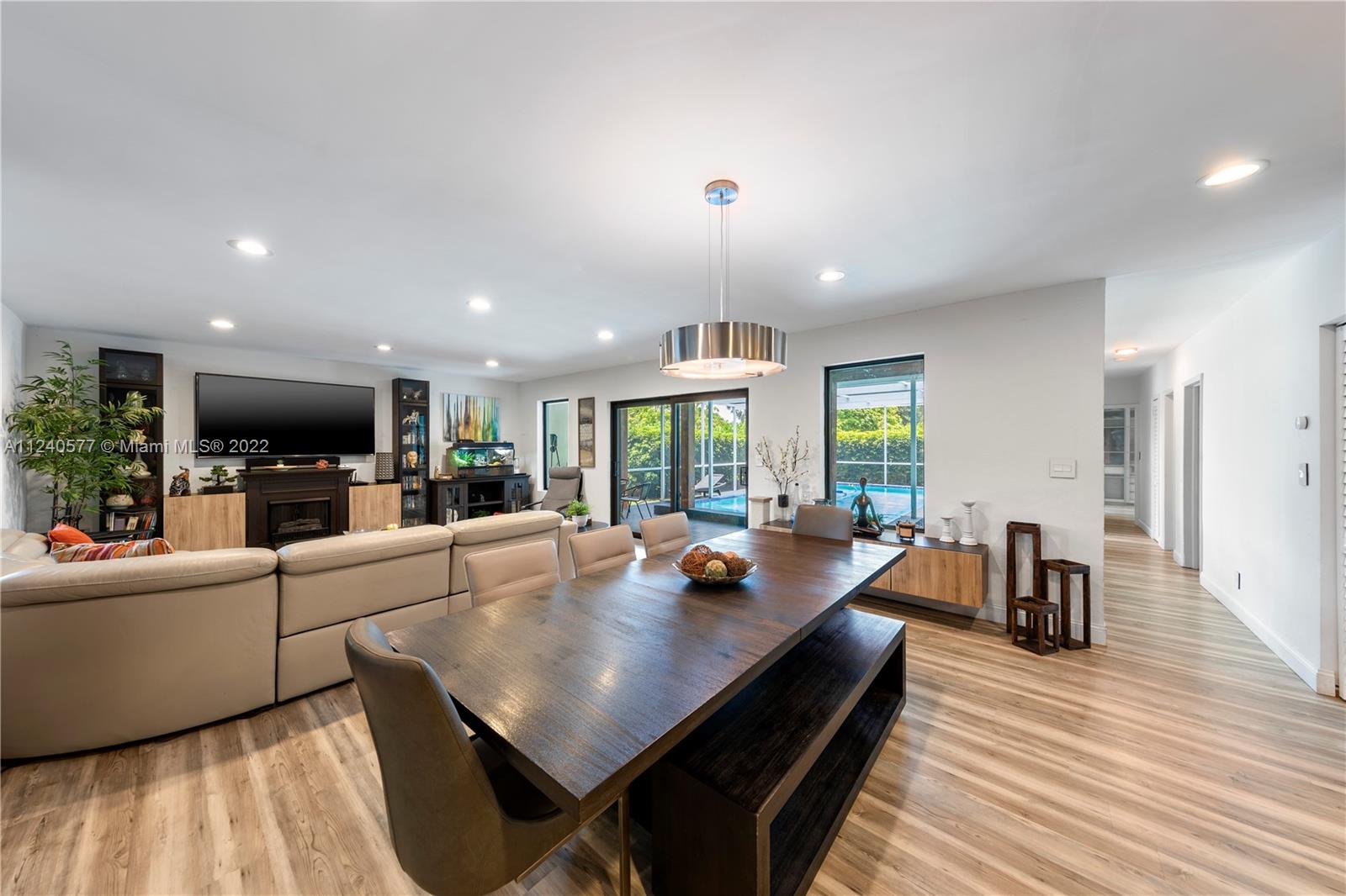 19760 Southwest 242nd Terrace Homestead, FL 33031 - Photo 6 of 49 a living room with furniture and a large window