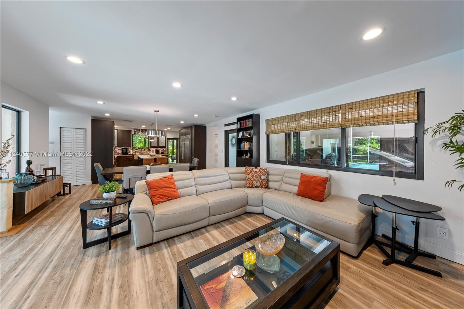 19760 Southwest 242nd Terrace Homestead, FL 33031 - Photo 7 of 49 a living room with furniture and a large window