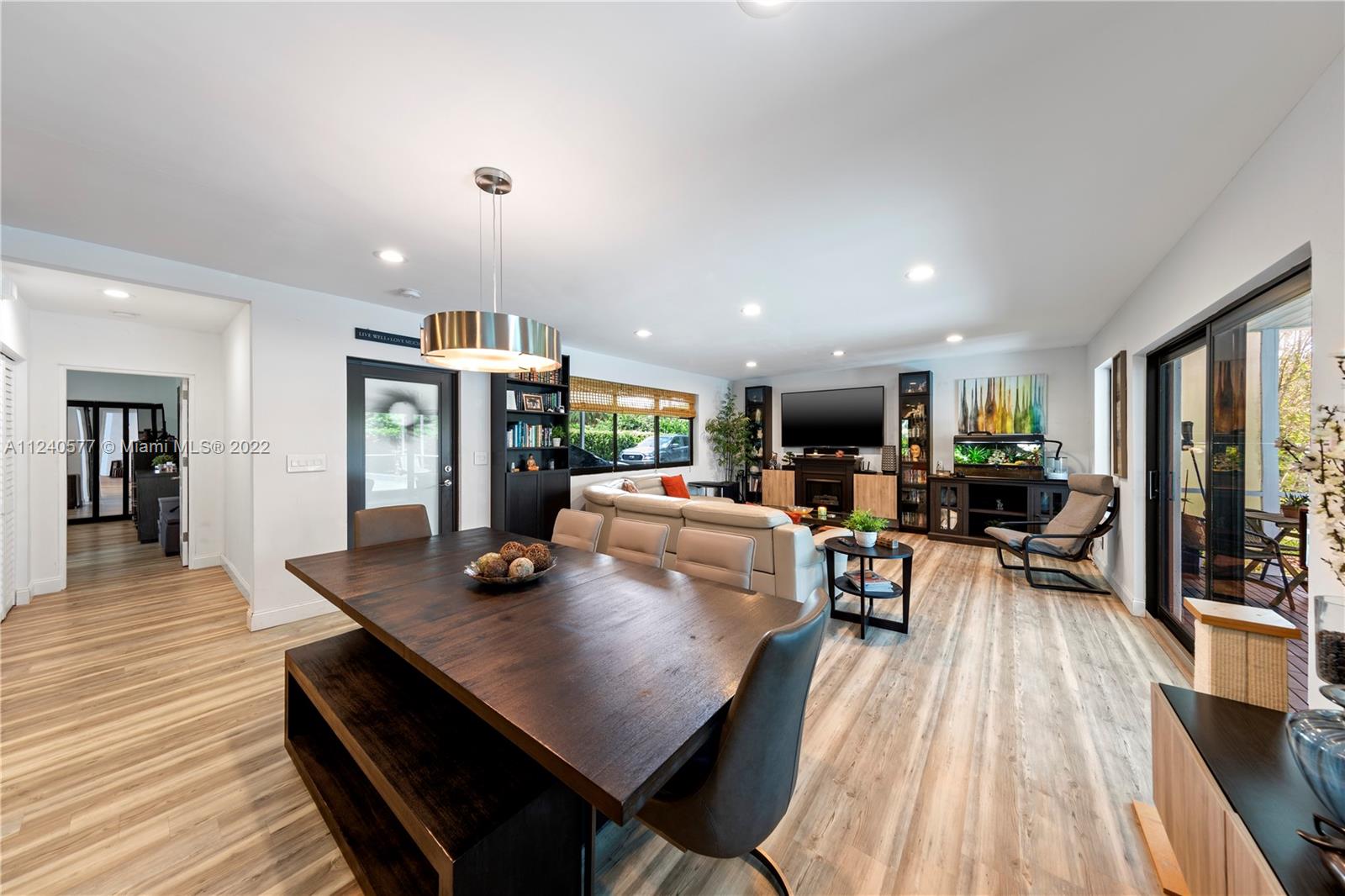 19760 Southwest 242nd Terrace Homestead, FL 33031 - Photo 9 of 49 a view of a dining room with furniture window and wooden floor