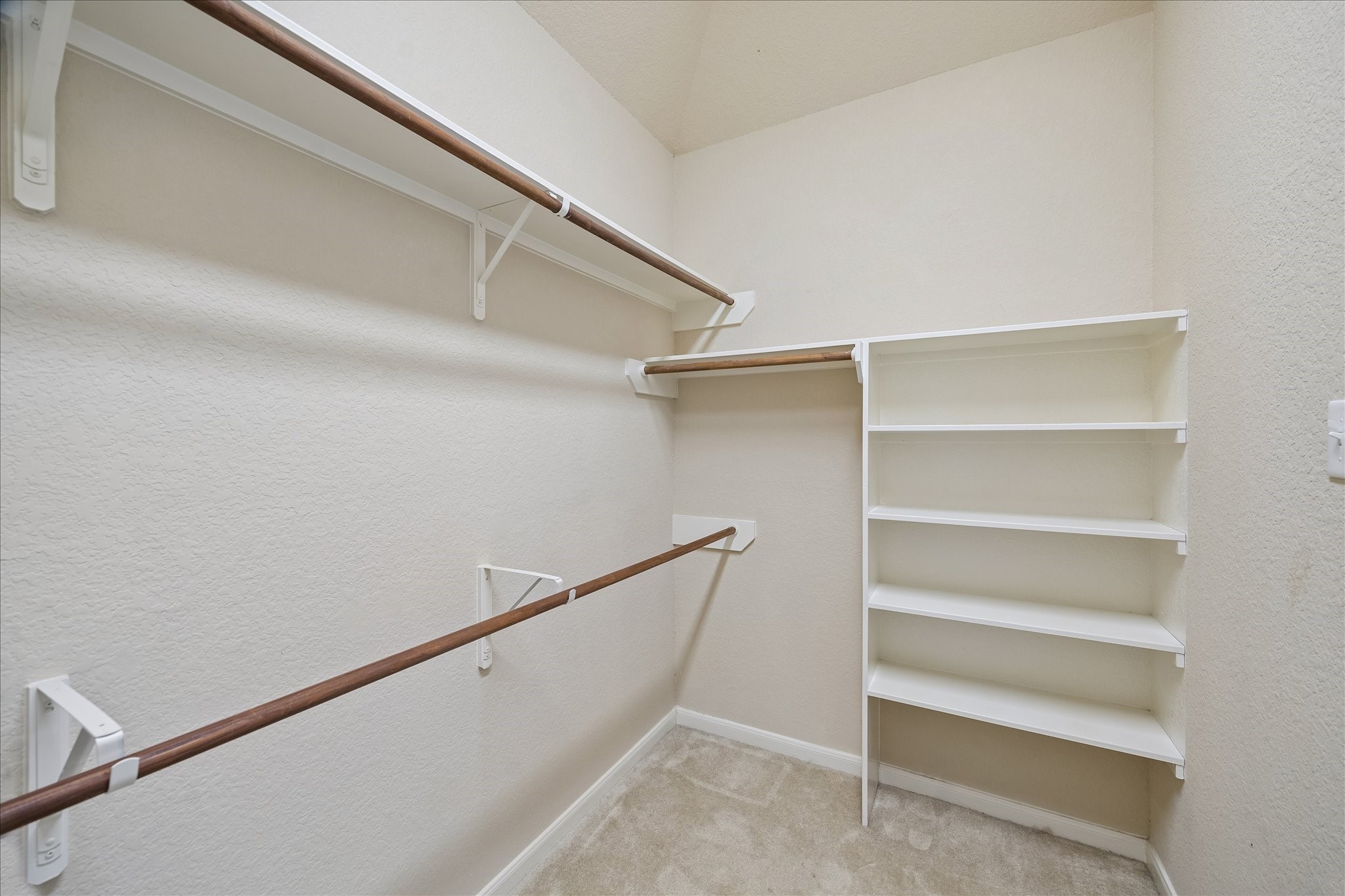 13006 Millstream Bend Lane Tomball, TX 77377 - Photo 15 of 25 a view of an empty walk in closet
