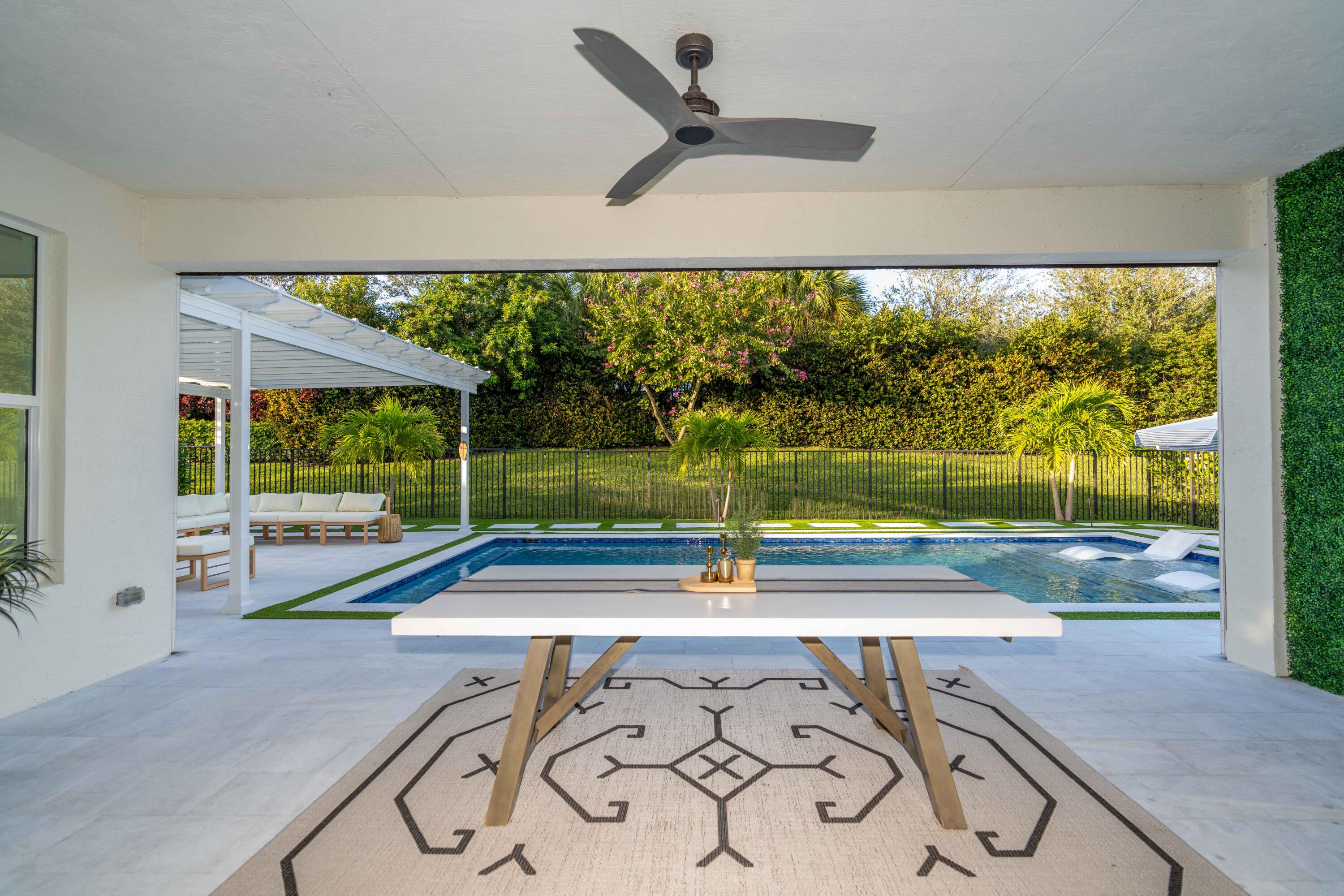9591 Eagle River Road Delray Beach, FL 33446 - Photo 14 of 45 MOTORIZED SCREEN PATIO
