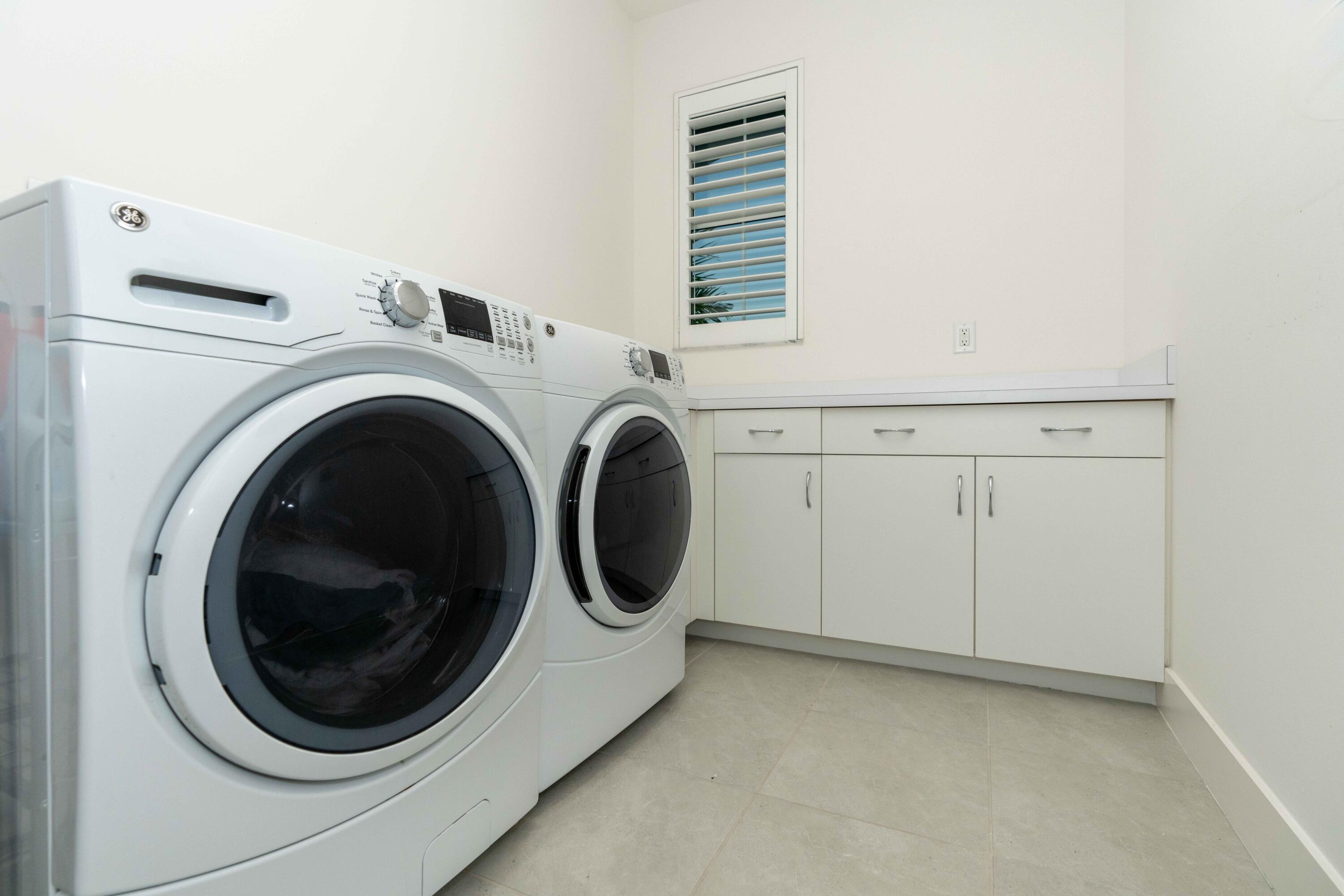 9591 Eagle River Road Delray Beach, FL 33446 - Photo 28 of 45 LAUNDRY OOM 2ND FLR