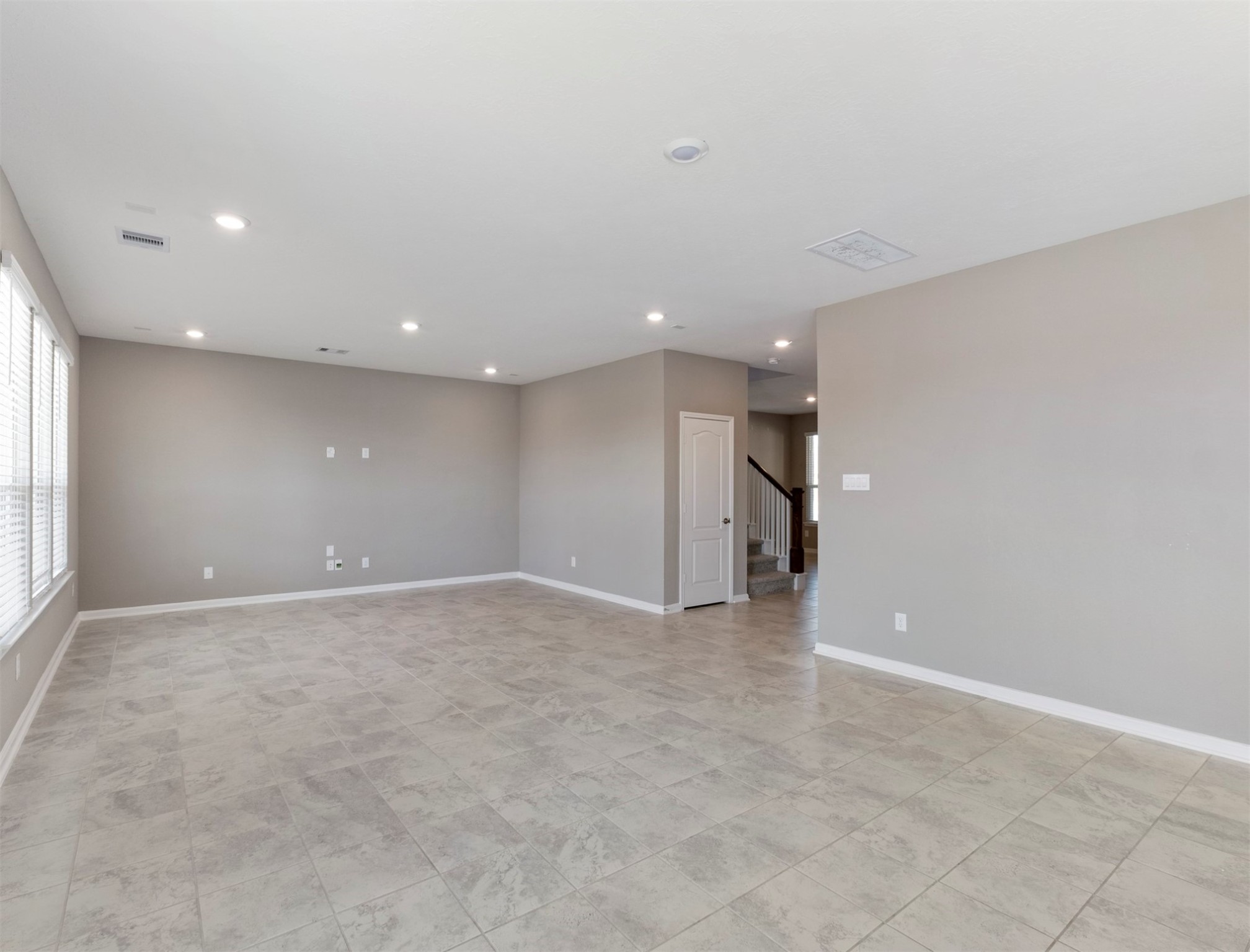 5712 Bluebonnet Lane Rosenberg, TX 77469 - Photo 8 of 16 a view of an empty room with a kitchen