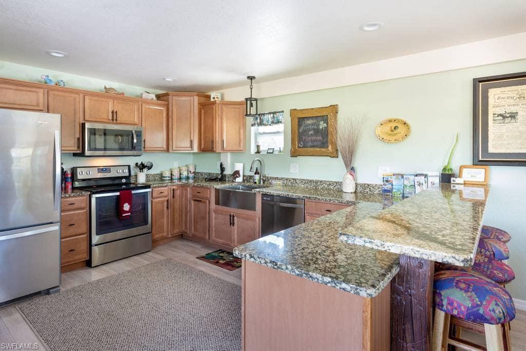 6050 Stringfellow Road St. James City, FL 33956 - Photo 16 of 23