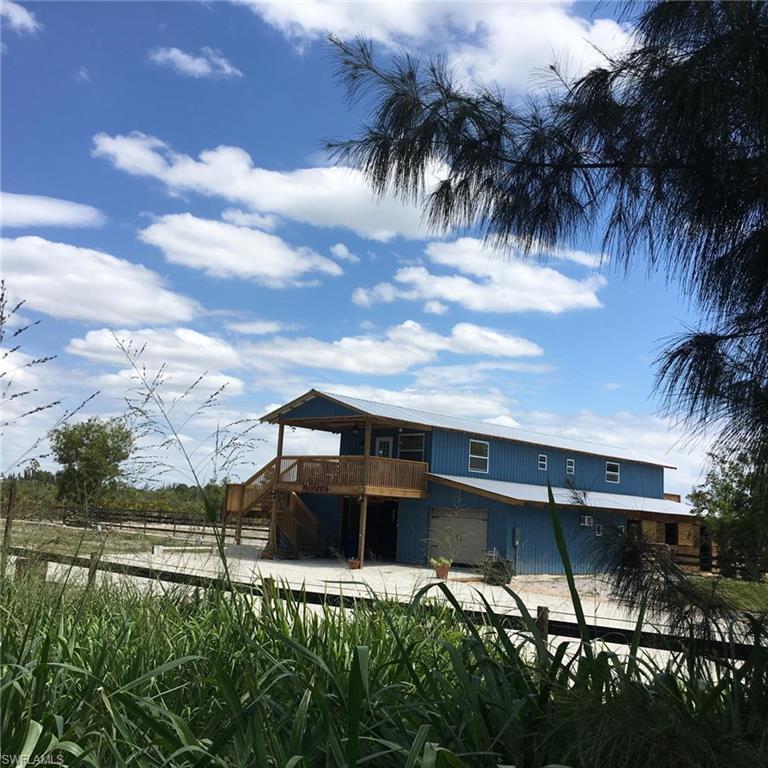 6050 Stringfellow Road St. James City, FL 33956 - Photo 3 of 23 Barn and home in one!