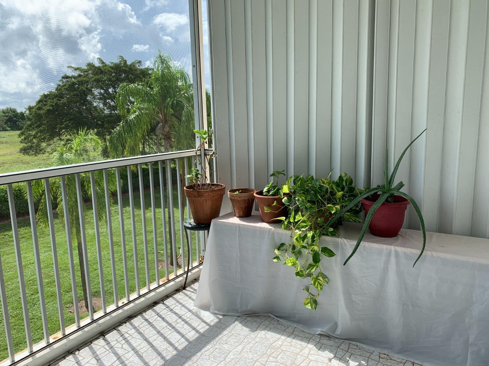5700 Northwest 2nd Avenue, Unit 311 Boca Raton, FL 33487 - Photo 8 of 12 5700 311 patio