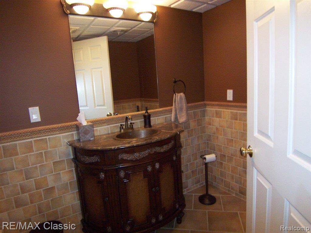 577 Snowfall Court, Unit 48 Howell, MI 48843 - Photo 20 of 24 Bsmt Elegant Vanity.JPG