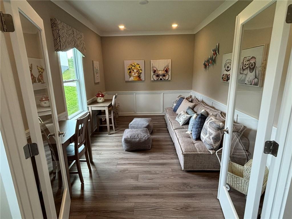 160 Raphael Court Clinton, PA 15026 - Photo 5 of 19 a bedroom with furniture and a wooden floor