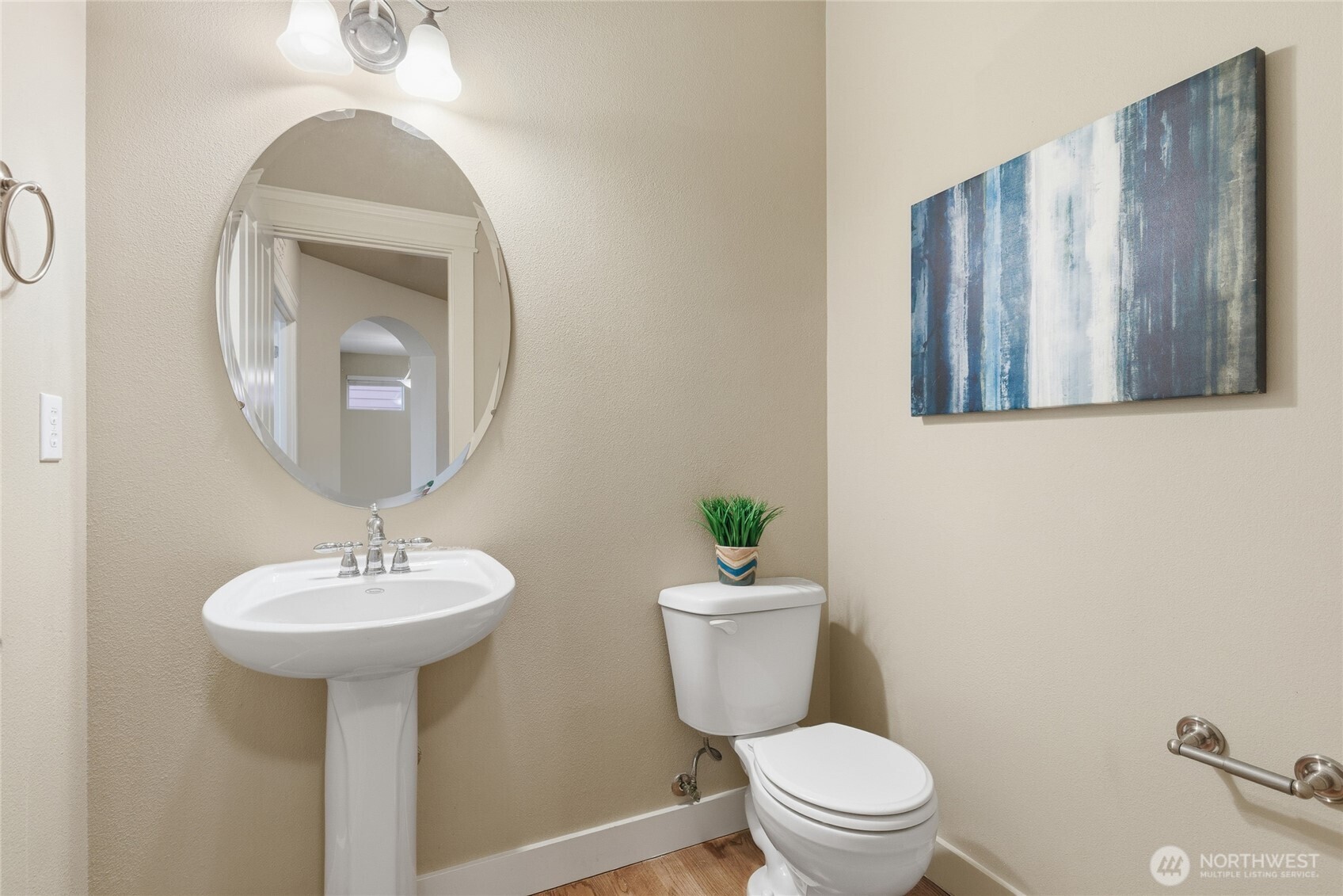 4510 McKinley Street Northeast Lacey, WA 98516 - Photo 12 of 34 a bathroom with a toilet sink and mirror