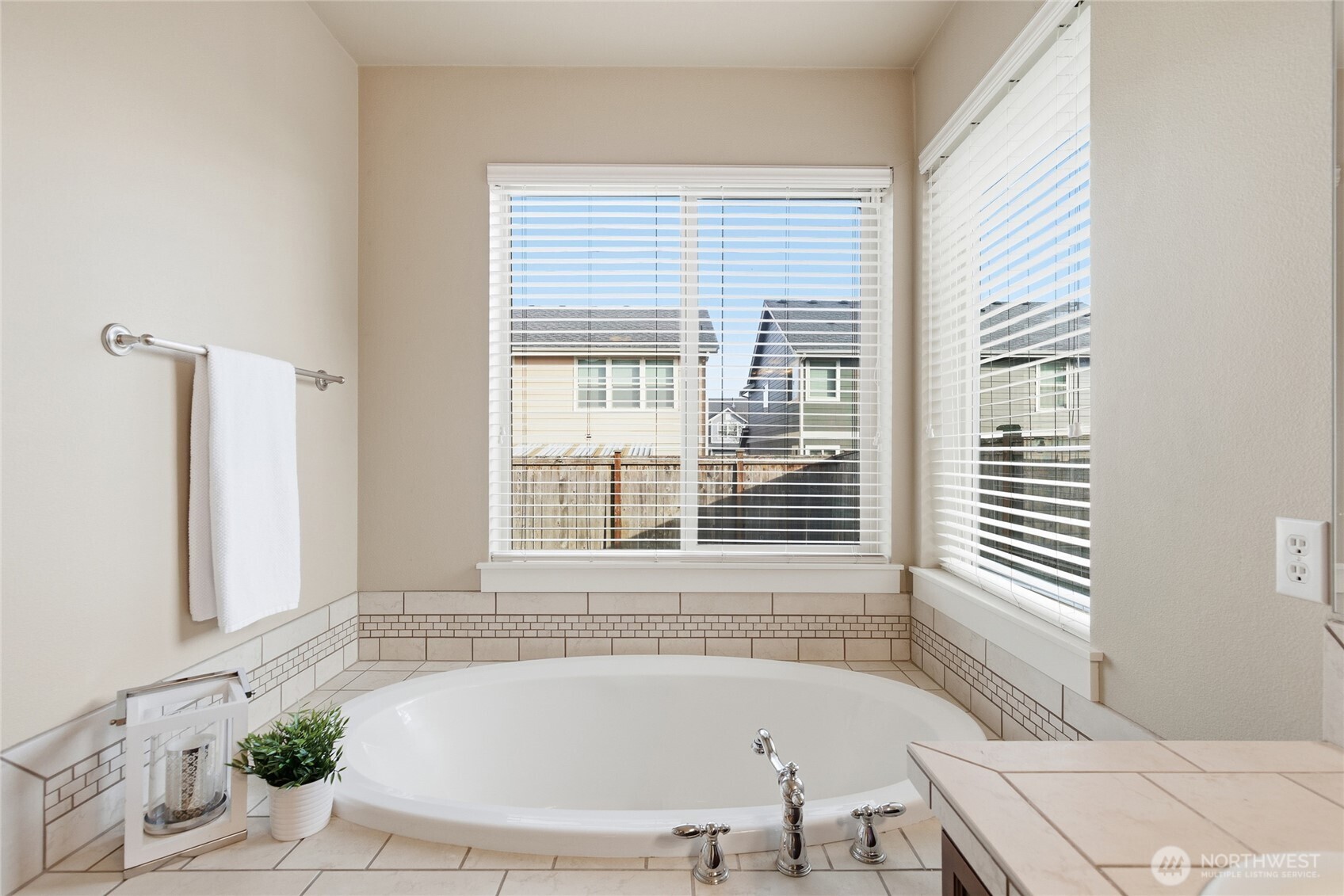 4510 McKinley Street Northeast Lacey, WA 98516 - Photo 16 of 34 a white bath tub sitting next to a window