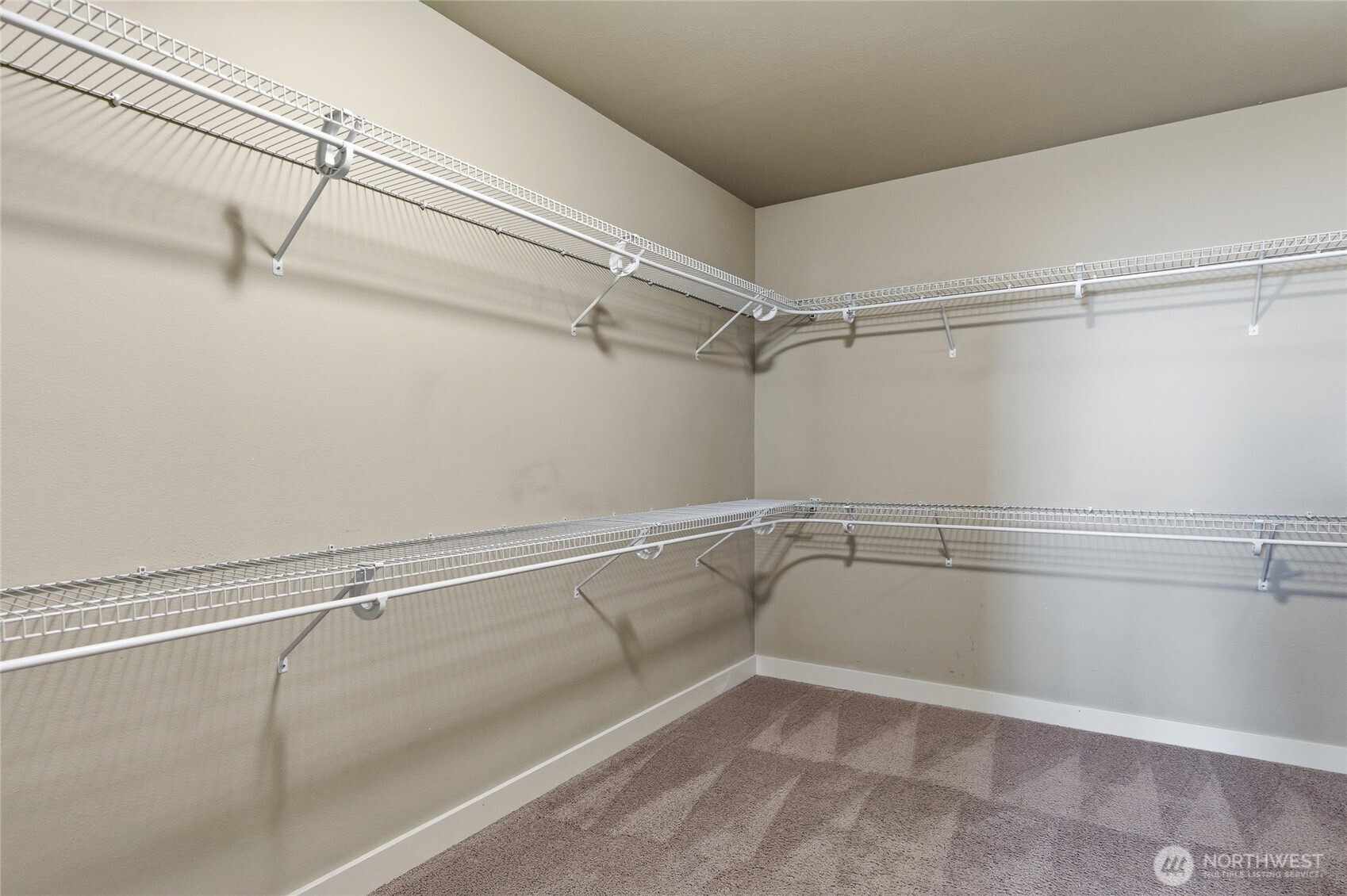 4510 McKinley Street Northeast Lacey, WA 98516 - Photo 17 of 34 a view of a room with racks on the wall