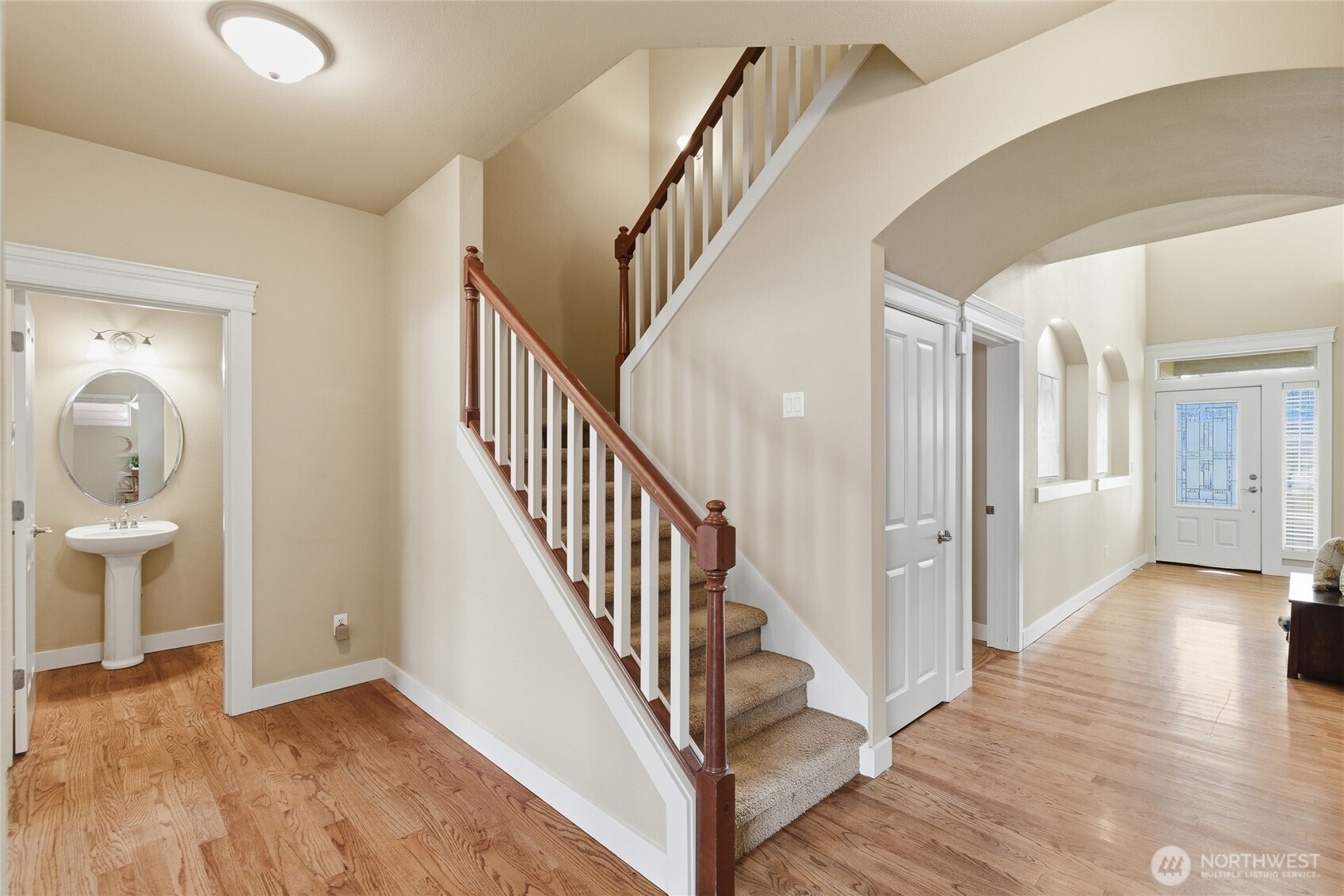 4510 McKinley Street Northeast Lacey, WA 98516 - Photo 18 of 34 a view of a hallway with wooden floor and entryway