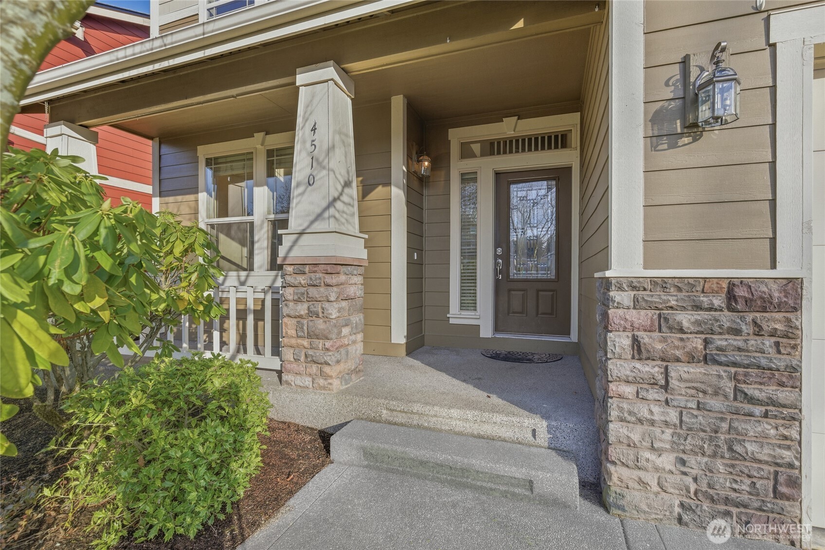4510 McKinley Street Northeast Lacey, WA 98516 - Photo 2 of 34 front view of a house with a potted plant and windows
