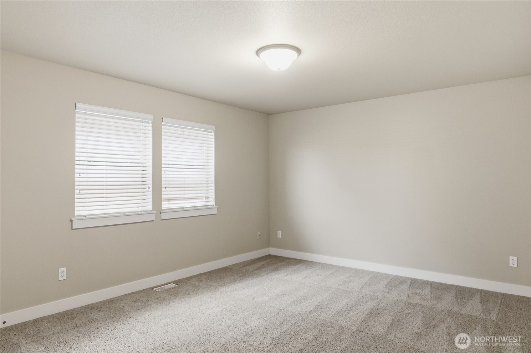 4510 McKinley Street Northeast Lacey, WA 98516 - Photo 21 of 34 an empty room with a window