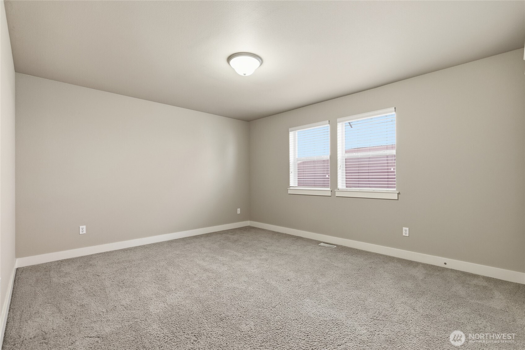 4510 McKinley Street Northeast Lacey, WA 98516 - Photo 22 of 34 an empty room with windows