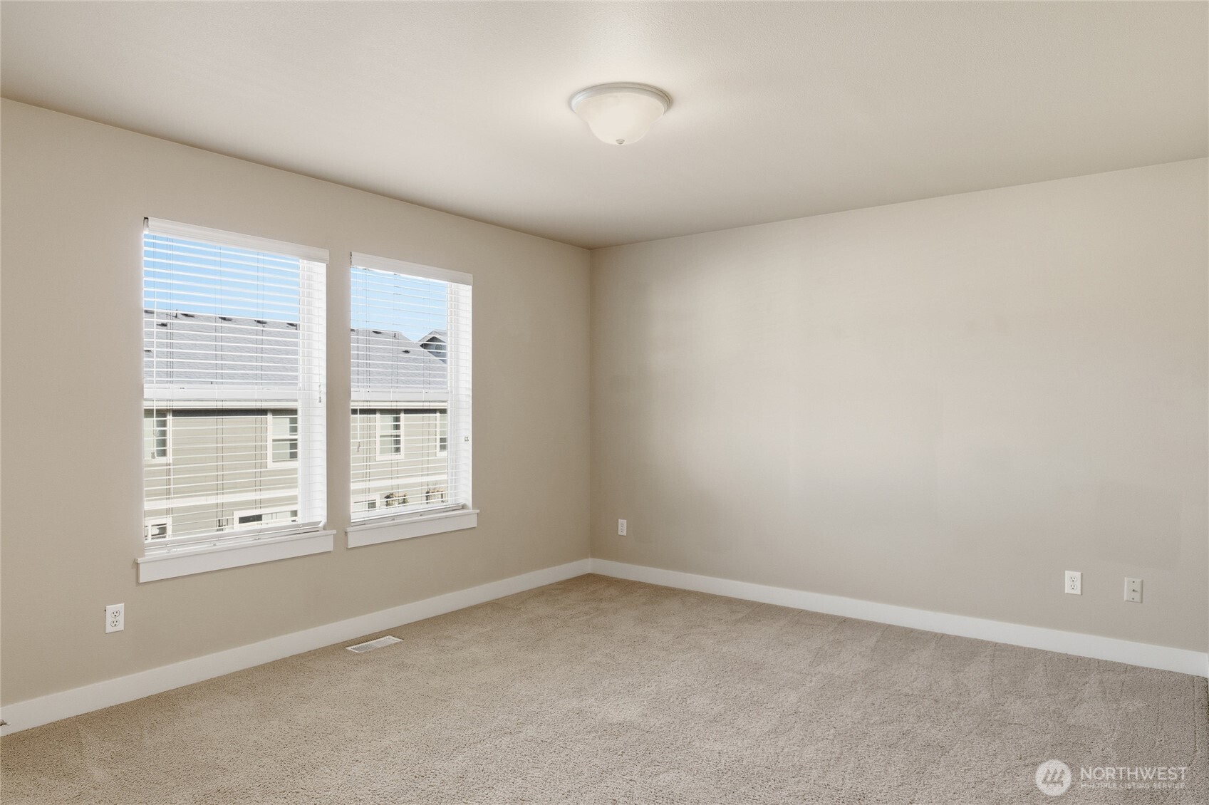 4510 McKinley Street Northeast Lacey, WA 98516 - Photo 23 of 34 an empty room with windows and closet