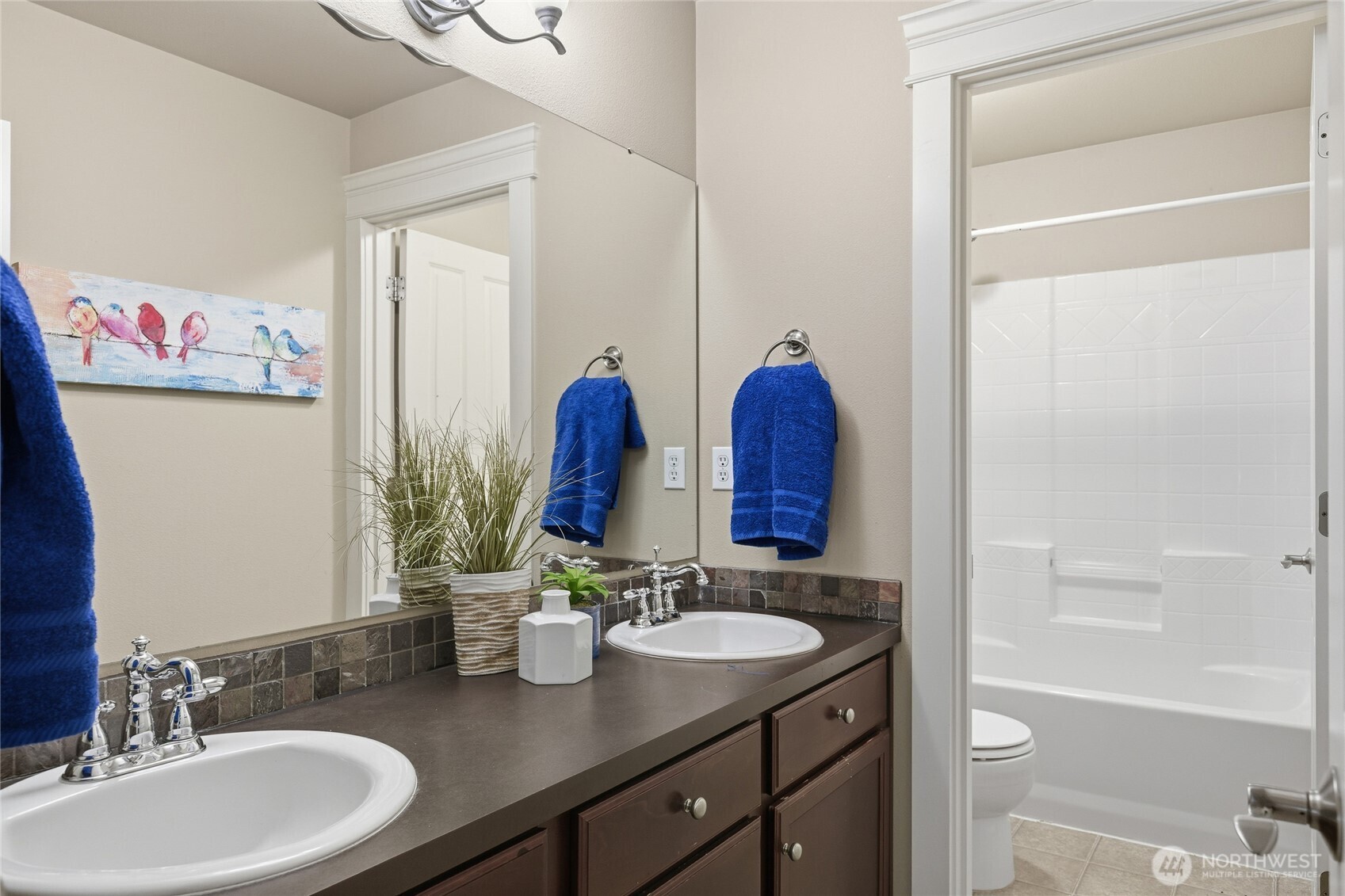4510 McKinley Street Northeast Lacey, WA 98516 - Photo 24 of 34 a bathroom with a granite countertop sink and a mirror
