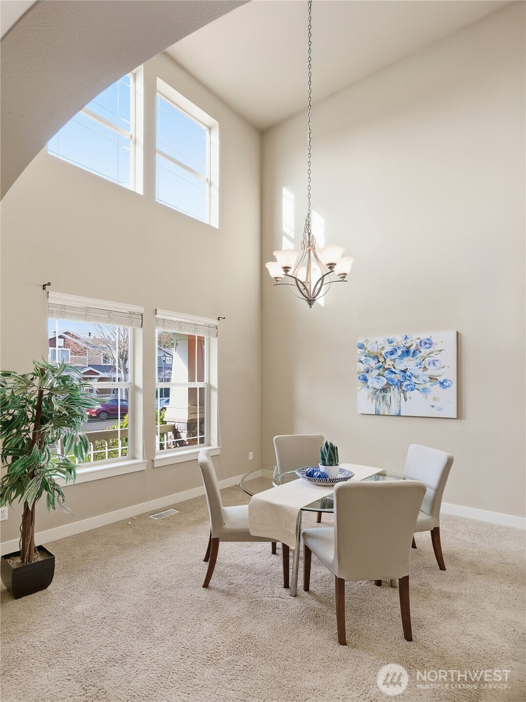 4510 McKinley Street Northeast Lacey, WA 98516 - Photo 4 of 34 a view of a dining room with furniture and a potted plant