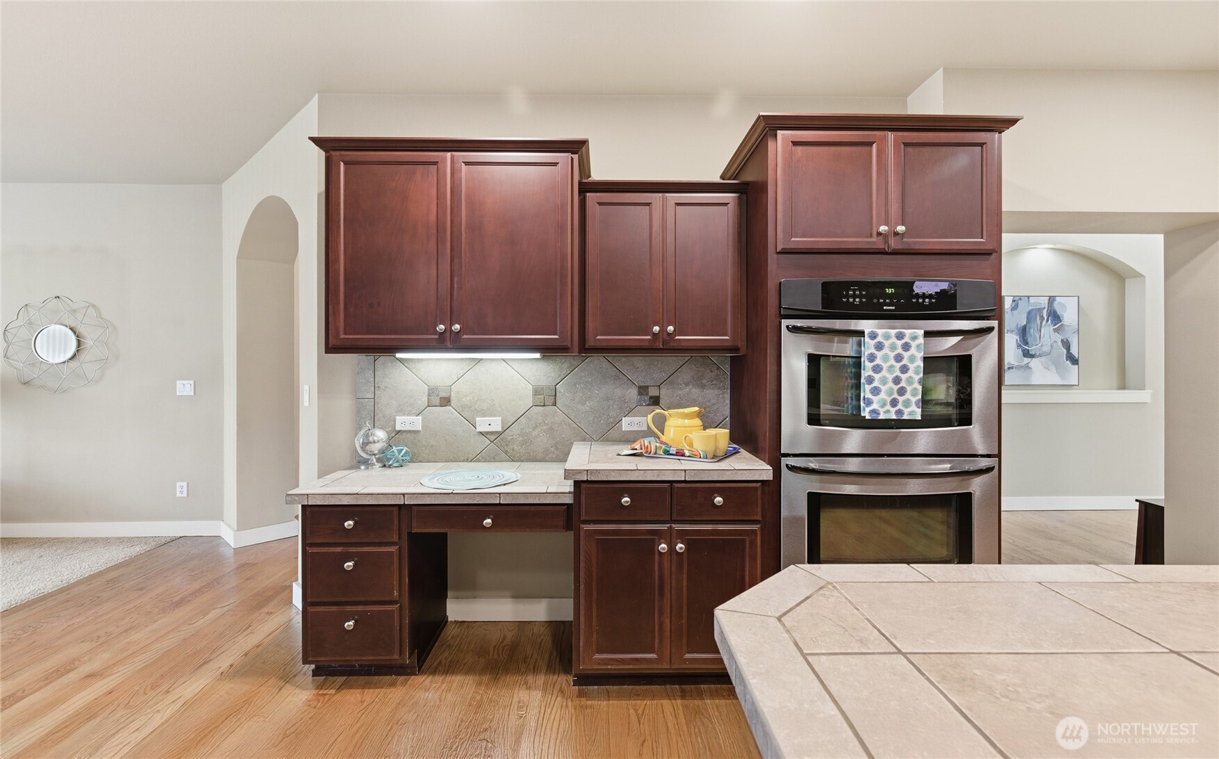 4510 McKinley Street Northeast Lacey, WA 98516 - Photo 8 of 34 a kitchen with stainless steel appliances granite countertop a stove and a refrigerator