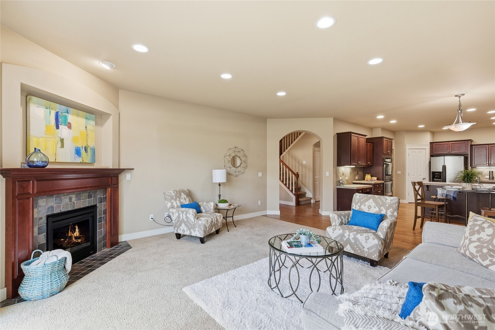 4510 McKinley Street Northeast Lacey, WA 98516 - Photo 10 of 34 a living room with furniture and a fireplace