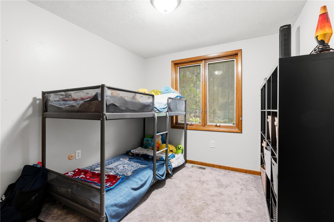 1940 Armstrong Road Fairborn, OH 45324 - Photo 30 of 48 This cozy bedroom features ample natural light, creating a bright and inviting atmosphere.