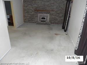 41510 Hanford Road Canton, MI 48187 - Photo 4 of 10 Family room with wood stove.JPG