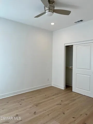 a bathroom with a toilet and a tub