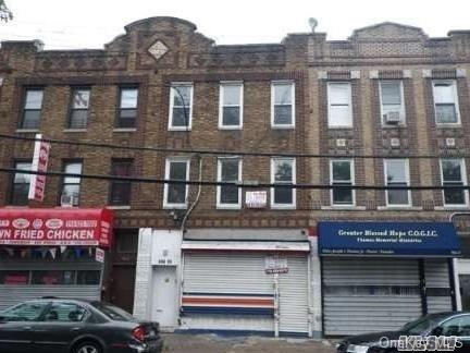 106-15 Guy R Brewer Boulevard Queens, NY 11433 - Photo 1 of 1 a front view of multi story residential apartment building