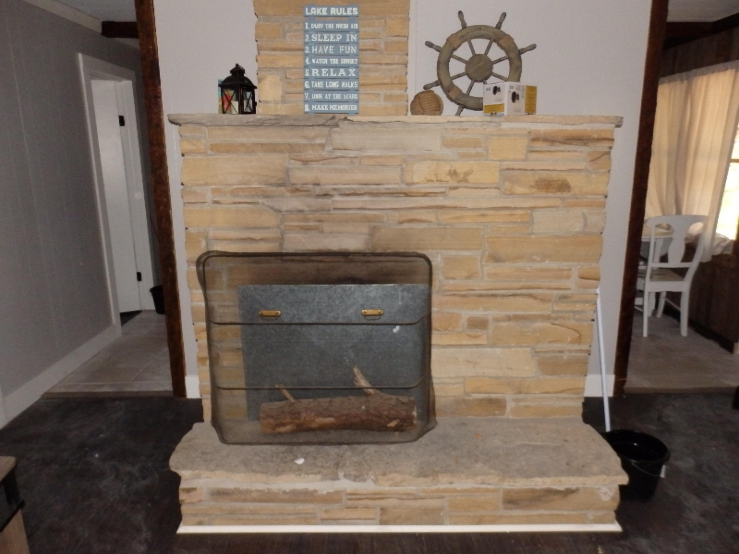 3210 Lakeshore Road Manistee, MI 49660 - Photo 5 of 14 fireplace