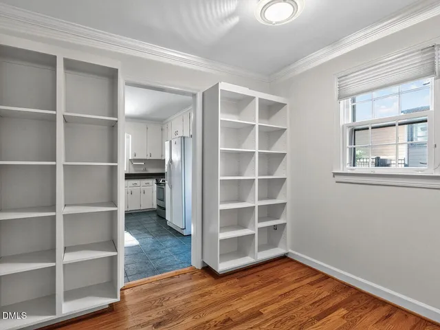 a kitchen with sink and cabinets