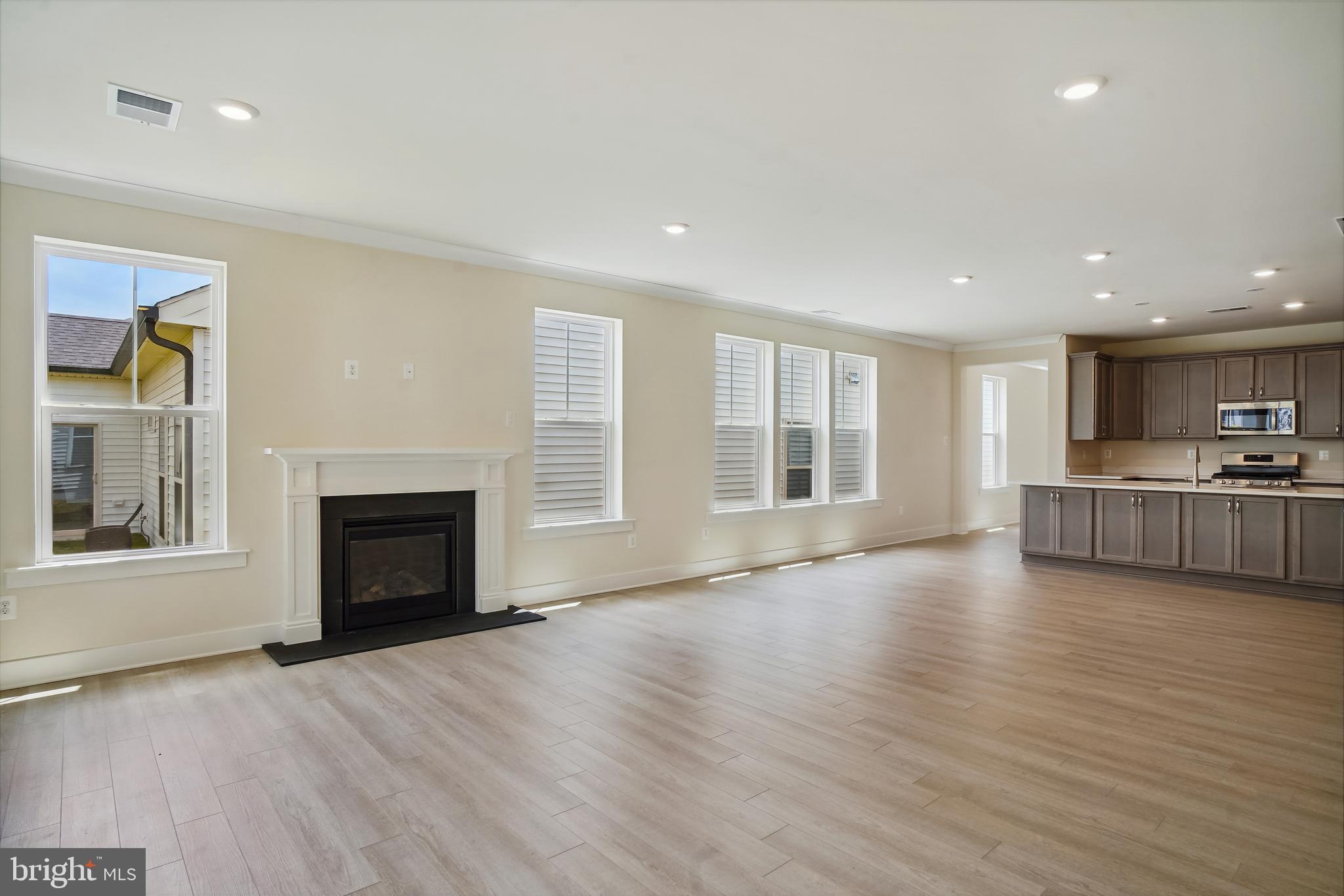 19 Cardinal Flower Way Gettysburg, PA 17325 - Photo 13 of 34 a view of an empty room with wooden floor and a window