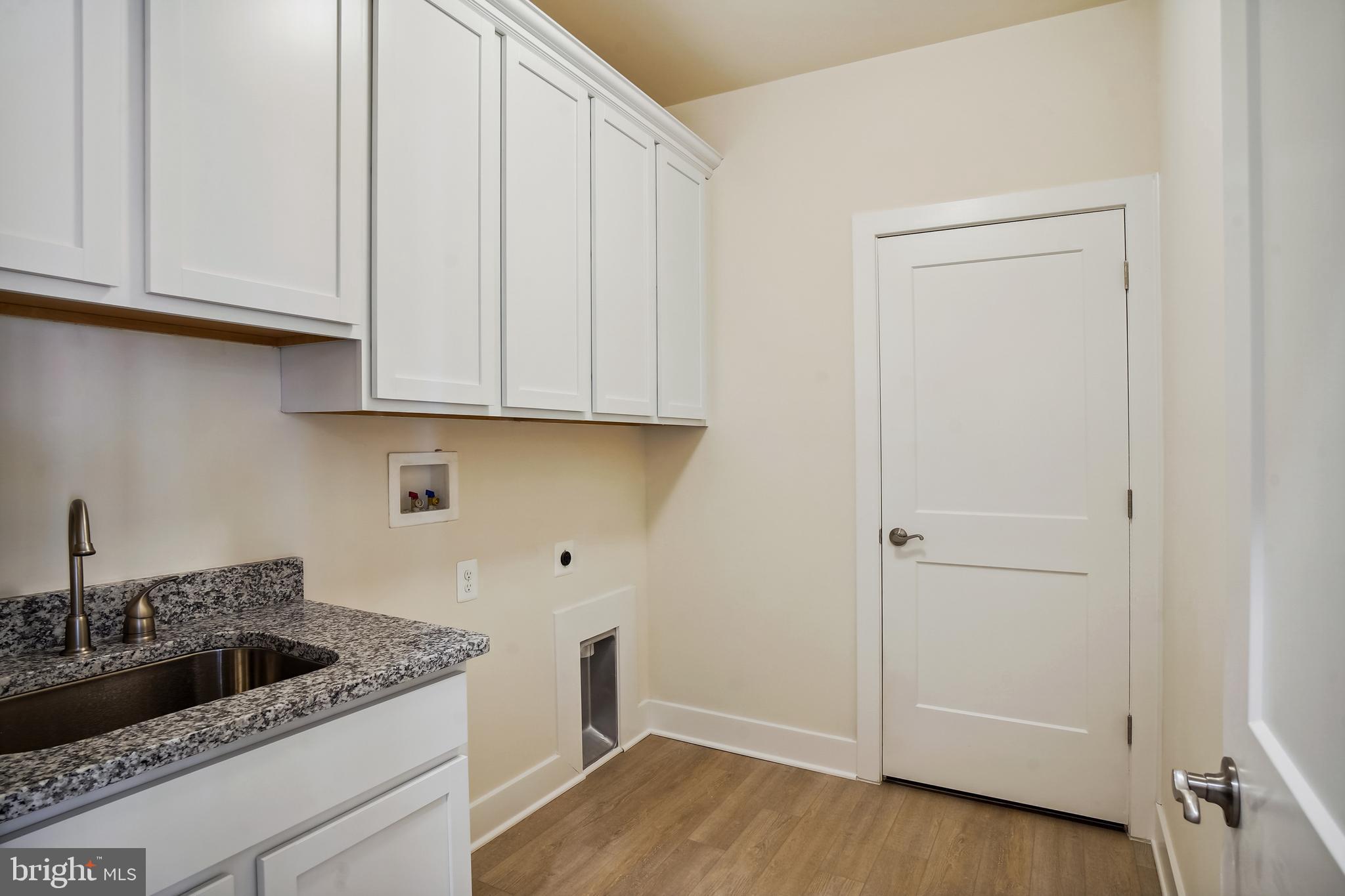 19 Cardinal Flower Way Gettysburg, PA 17325 - Photo 16 of 34 a kitchen with a sink and cabinets
