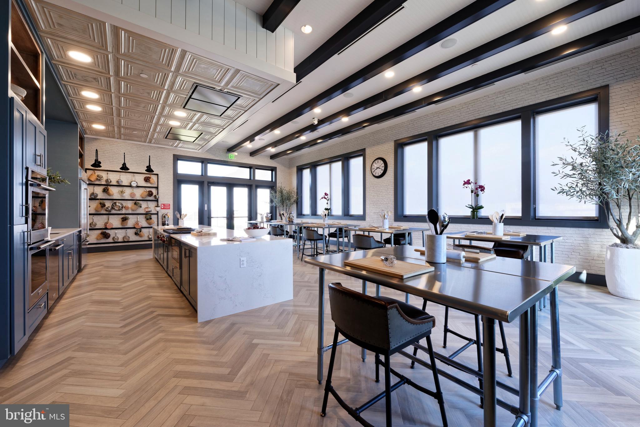 19 Cardinal Flower Way Gettysburg, PA 17325 - Photo 32 of 34 a room with lots of wooden furniture and a chandelier