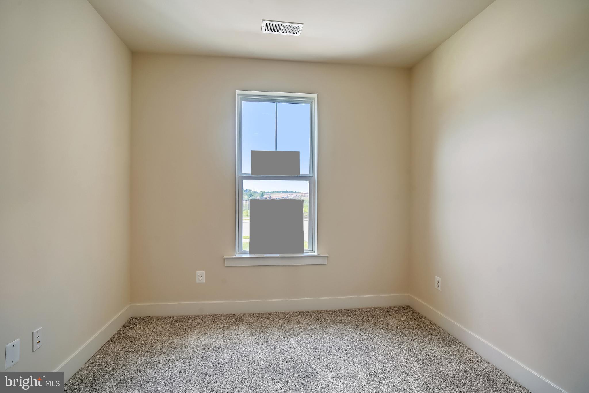 19 Cardinal Flower Way Gettysburg, PA 17325 - Photo 5 of 34 an empty room with a window