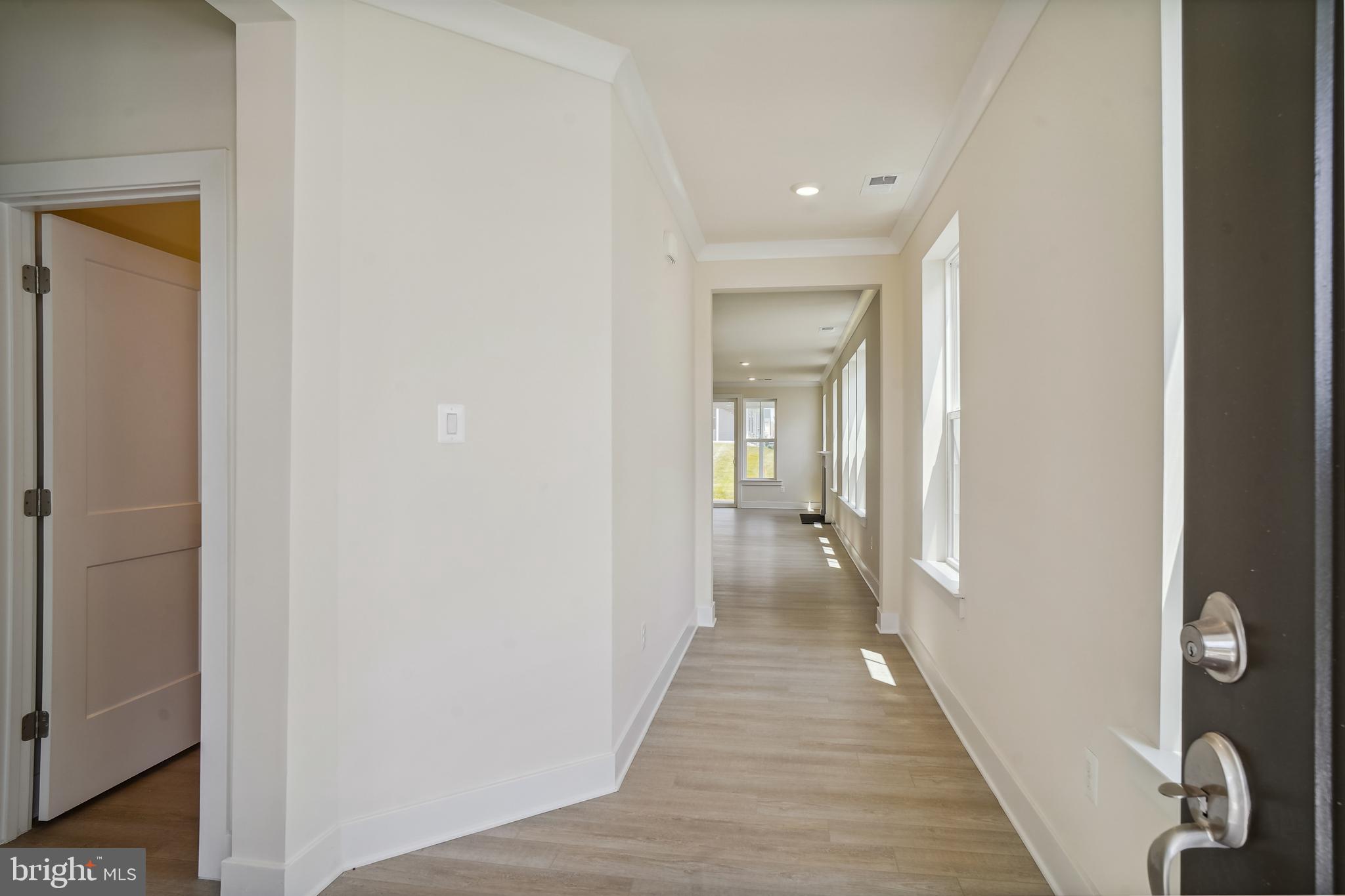 19 Cardinal Flower Way Gettysburg, PA 17325 - Photo 7 of 34 a view of a hallway with wooden floor