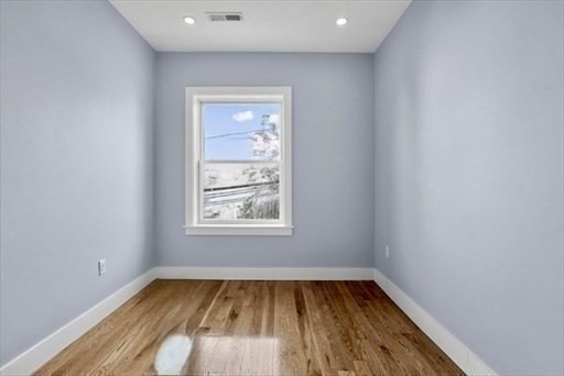 31 Homestead Street, Unit 2 Boston, MA 02121 - Photo 18 of 23 a view of a room with wooden floor and window